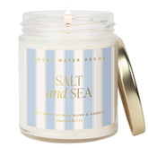 Sweet Water Decor Salt and Sea Patterned Candle in 9oz clear glass jar