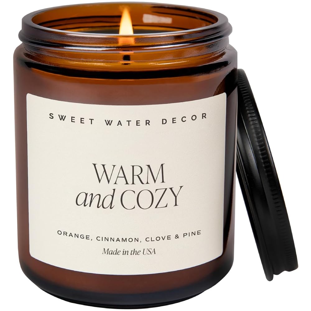 Sweet Water Decor Warm and Cozy Soy Candle in 9oz amber jar