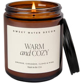 Sweet Water Decor Warm and Cozy Soy Candle in 9oz amber jar