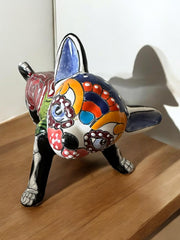 Chihuahua figure with lifted leg for Dia de los Muertos decor