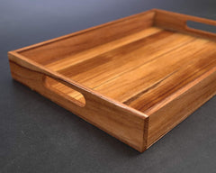 Premium teak wood tray highlighting natural grain