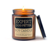 The Burlap Bag Expert Dog Petter 9oz soy candle amber glass jar with black lid