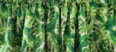 Tropical palm and banana tree leaf valance curtain close up