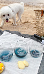 Turquoise crackle background wine glass detail