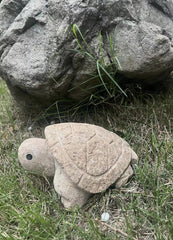 Turtle garden ornament carved from natural stone for yard decor