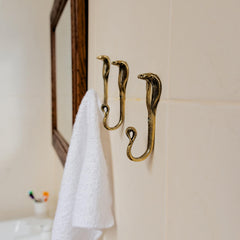 Cobra wall hook brass detail from Lutsk Ukraine workshop