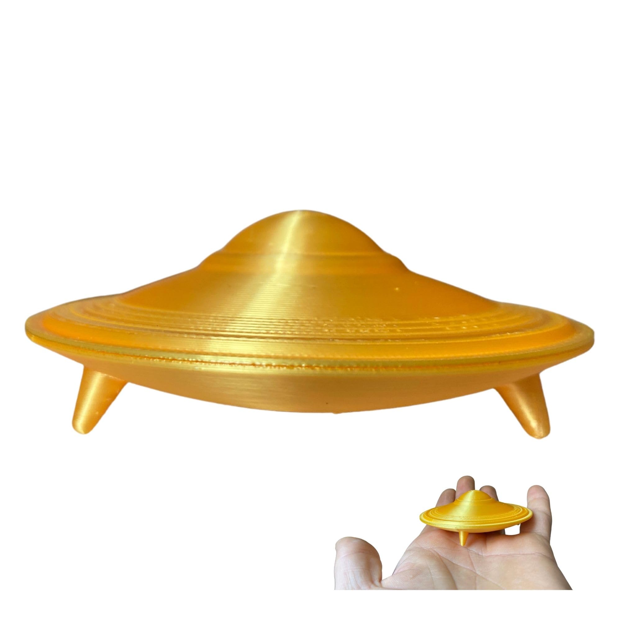 UFO Flying Saucer Figurine gold color on desk