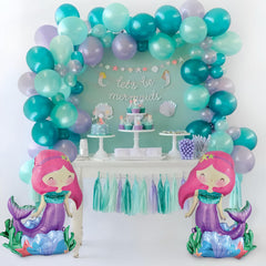 Seashell balloon part attached to mermaid tail before inflation