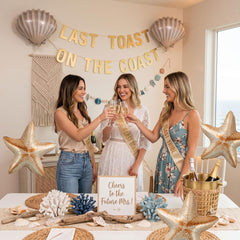 Under the sea party decorations with foil balloons displayed