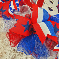 Deep 5 inch wreath with jute plaid accents and ribbons