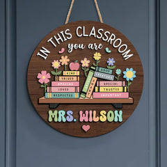 Vintage-inspired floral decor on classroom door sign