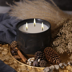 Viyffo matte black ceramic jar candle embossed with faces