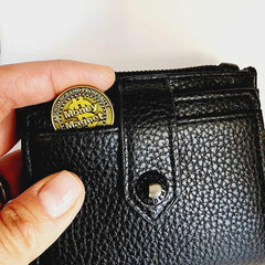 Wallet with amulet and cards