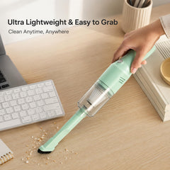 transparent dust cup on mini vacuum for crumbs