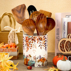 Utensil holder featuring autumn leaves pattern