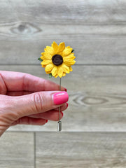 Wedding sunflower boutonniere for groom on lapel