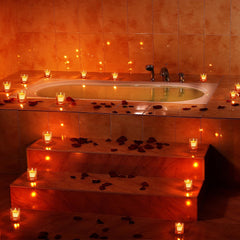 Floating candle in water display for centerpiece