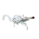 White glass rat figurine on display shelf