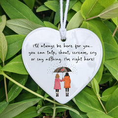 Includes two hanging strings for display versatility