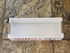 Toilet box featuring twine handles and Christmas colors