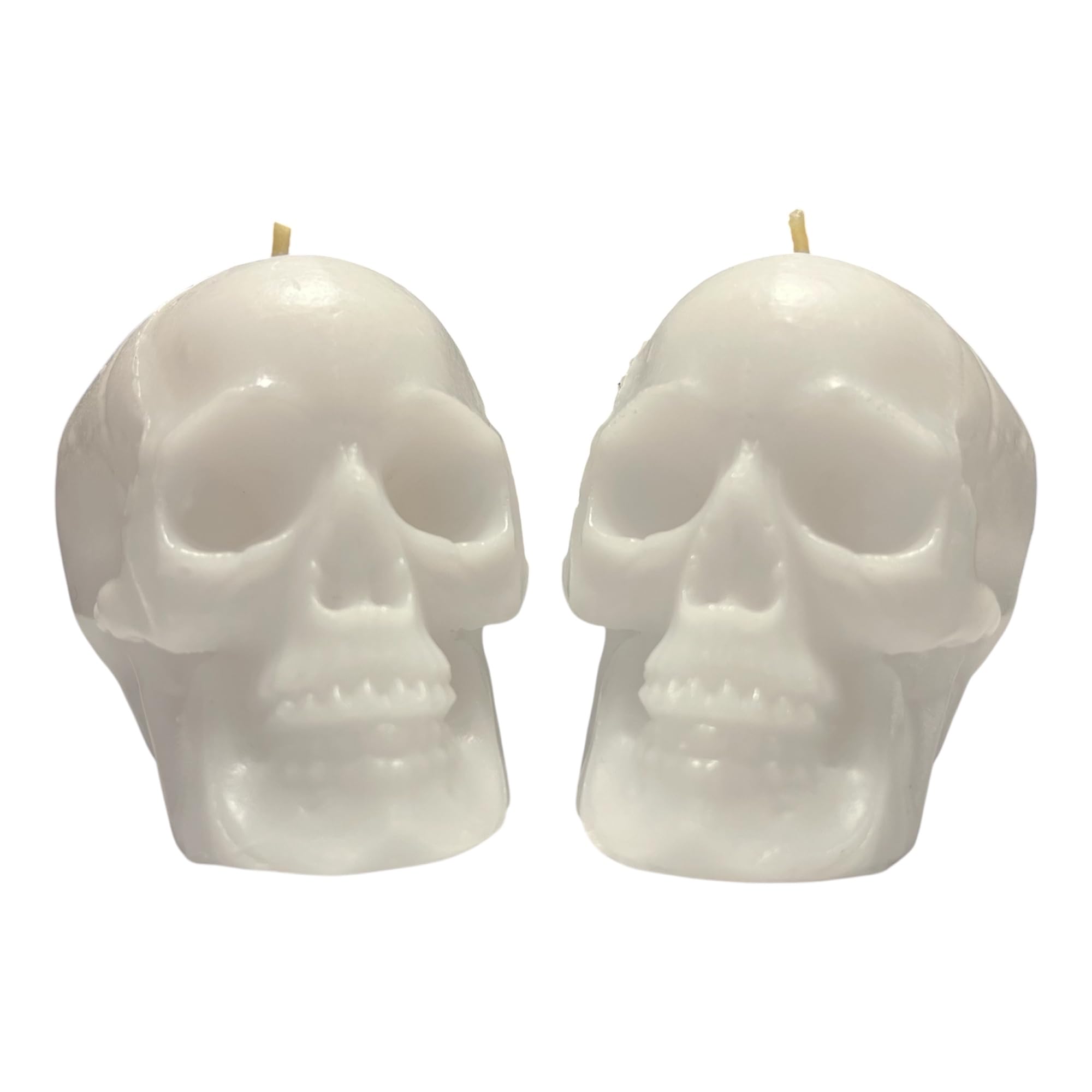 Two white skull candles in a 2 pack