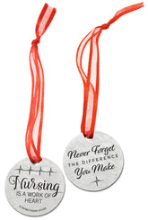 Whitney Howard Designs pewter nurse ornament with red ribbon