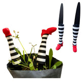 Wicked Witch Legs Mini Plant Pot Decor with legs emerging from a small pot