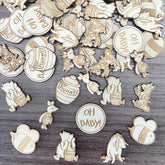 Winnie baby shower wooden confetti set on table