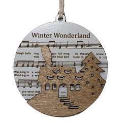 Winter Wonderland House Christmas Ornament 3.5 inch natural wood cottage silhouette with sheet music backdrop
