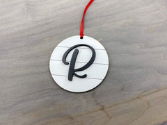 Back view of ornament with black Letter R