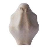 Wooden sculpture of a person trapped in wood for desk display