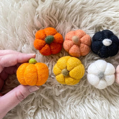 Wool Felt Pumpkins coral color 1.75in wide by 1.5in tall