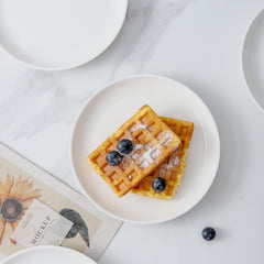 Stackable porcelain plate shows compact design
