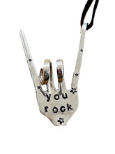 you rock holiday ornament made from recycled silver plate fork