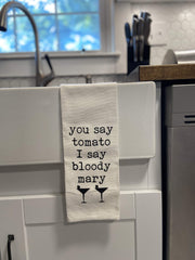 Bright white cotton tea towel with Bloody Mary print