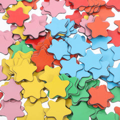 Star magnets holding notes on a whiteboard