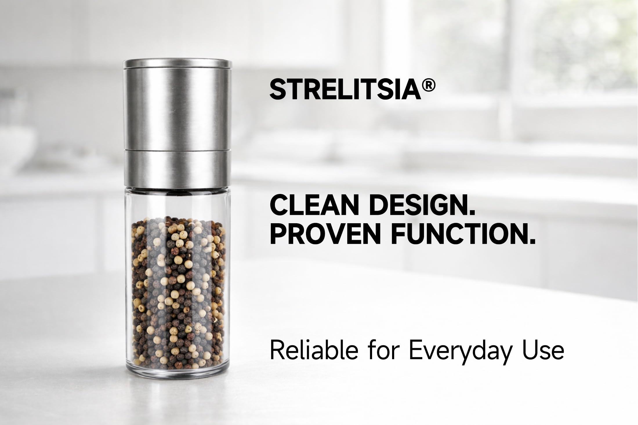 Clear glass chamber with stainless steel body pepper mill