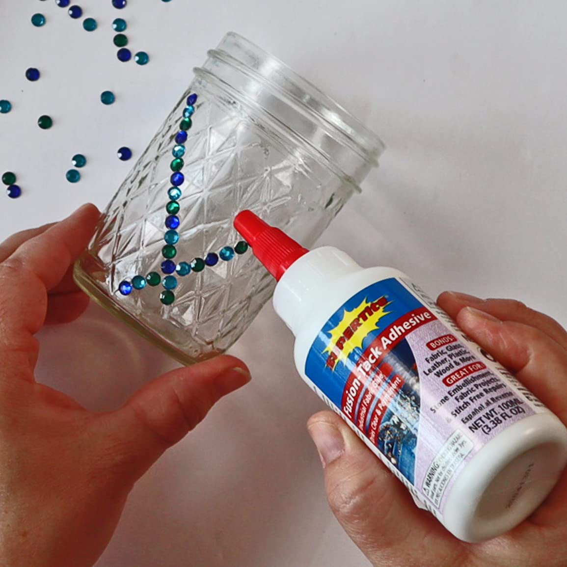 Ref-1159 Fusion Tack Adhesive bottle close up image