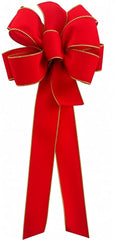 Close-up of red velvet bow with gold wired edge