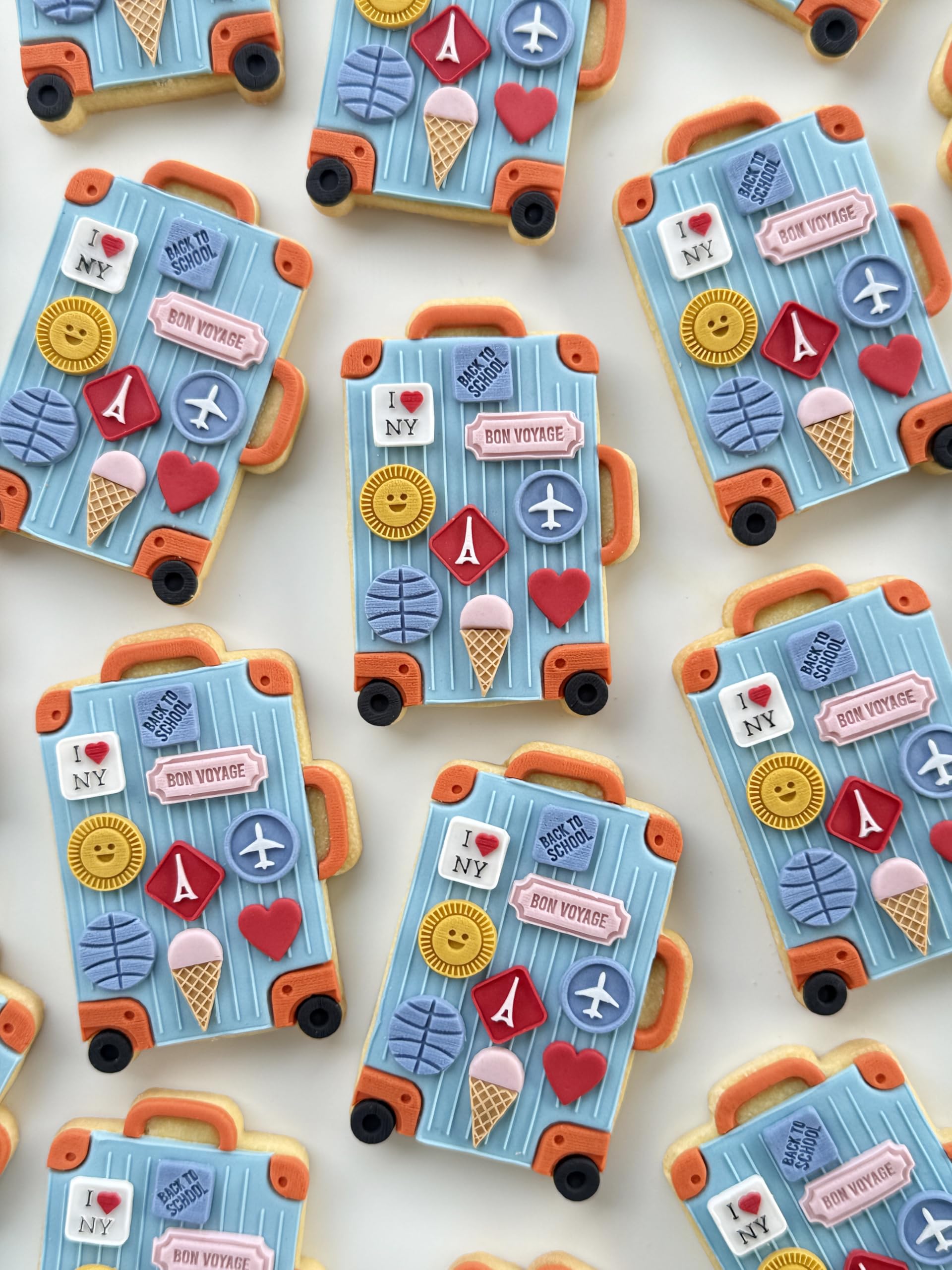 12 cookie fondant cutters included in Lorena's Sweets kit