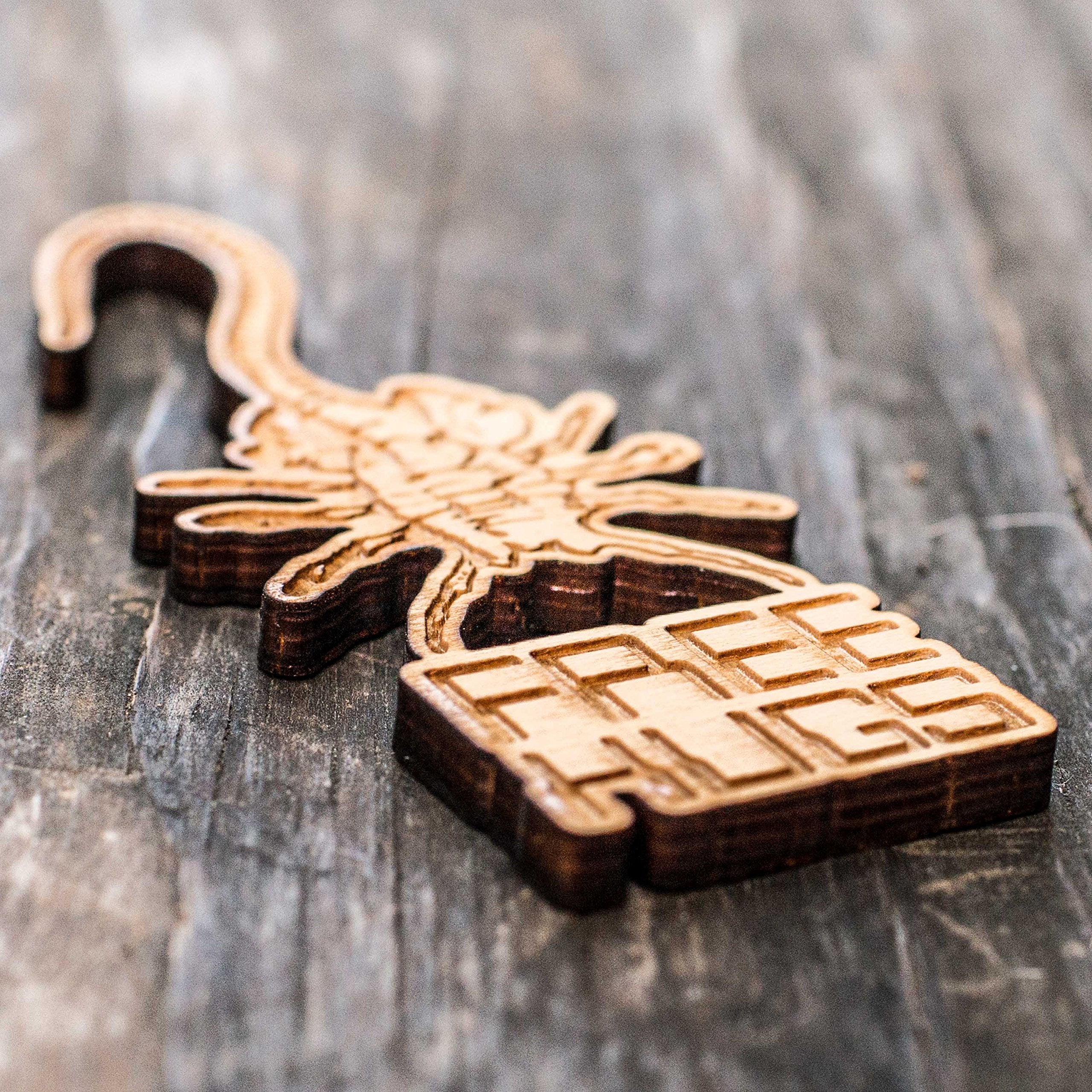 Free Hugs ornament on natural wood