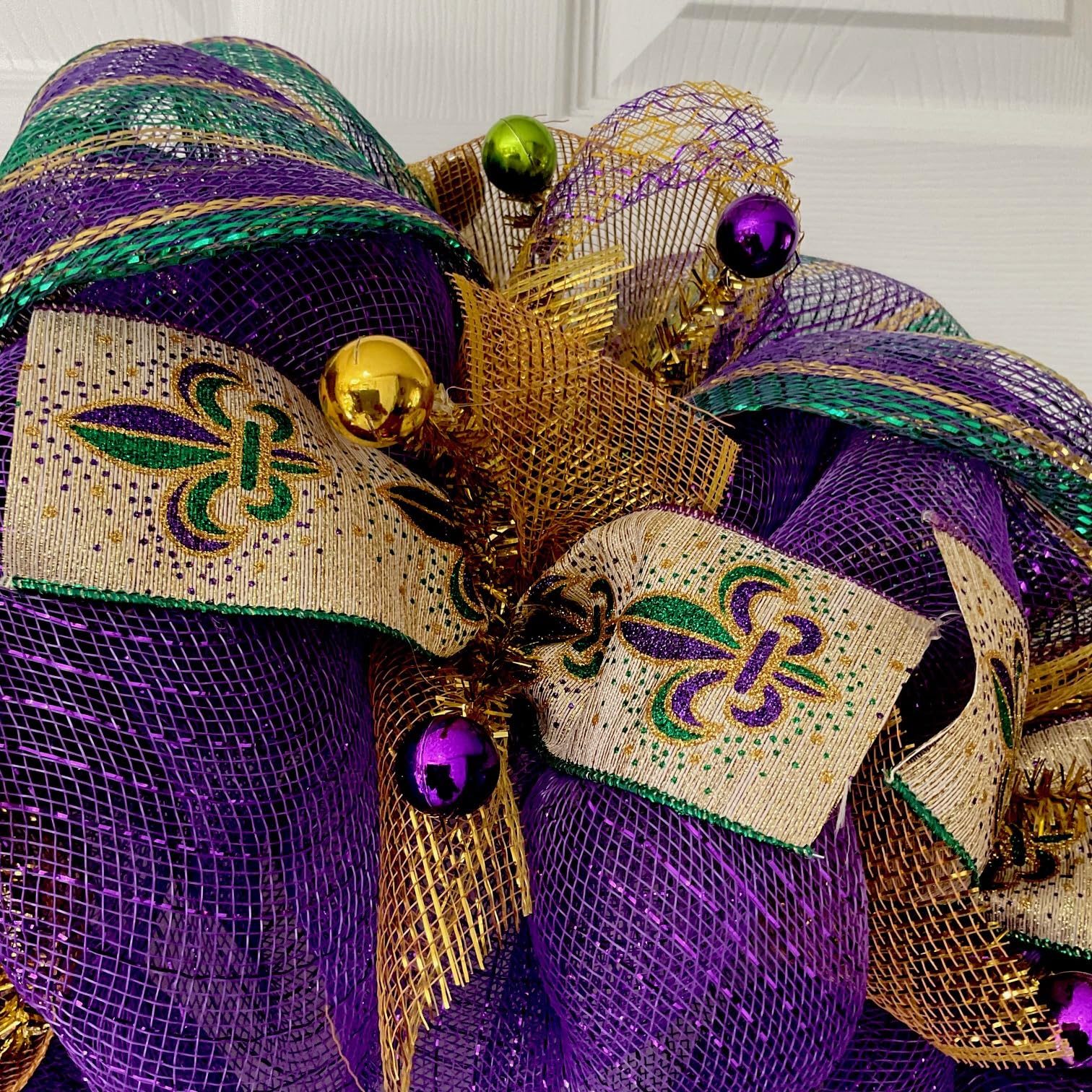 24 inch Mardi Gras deco mesh wreath showing depth