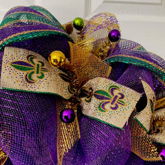 24 inch Mardi Gras deco mesh wreath showing depth