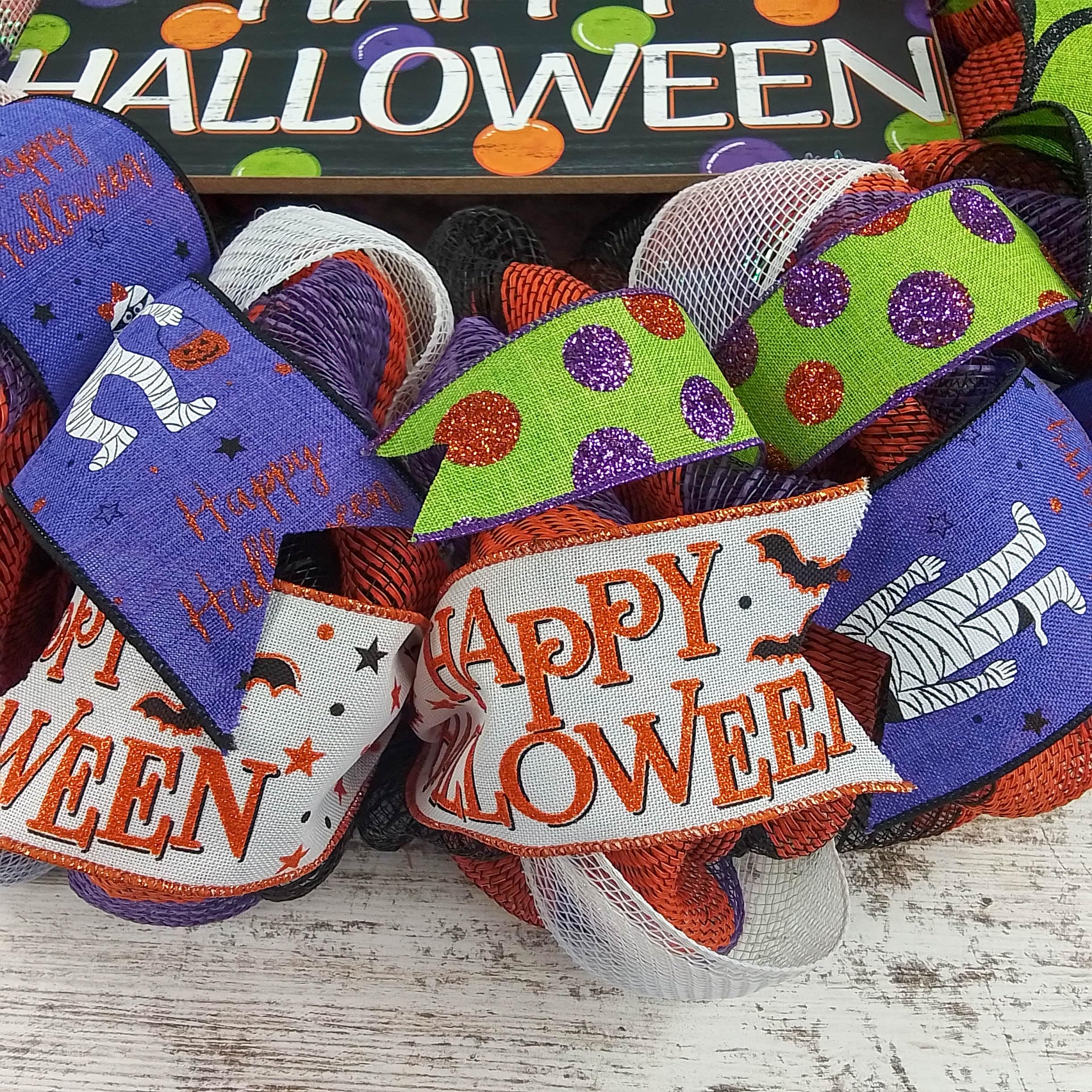 Colorful striped Halloween mesh wreath for front door