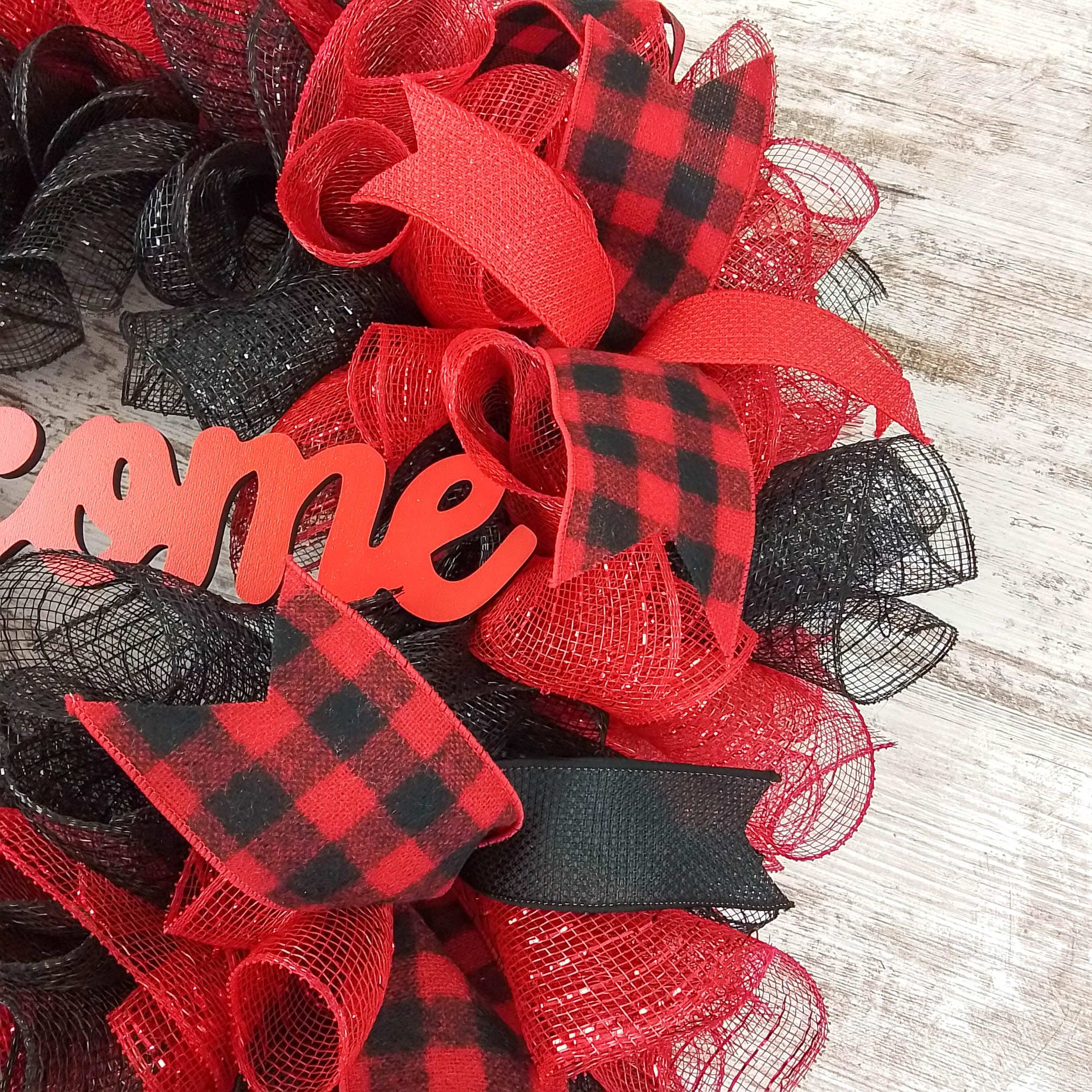 24 inch wreath with red black ribbons
