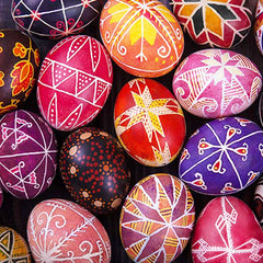 white plastic egg measuring 2.4 x 1.5 inches