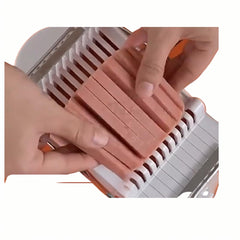 Compact slicer measuring 22 cm by 12.5 cm