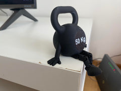 Compact desk sculpture with kettlebell shape dimensions 2.7 x 3 x 3 in