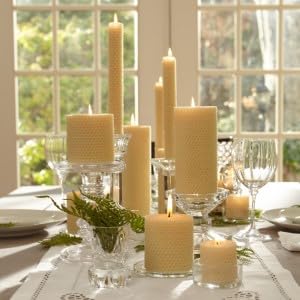 warm ambient glow from beeswax taper candle