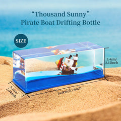 Acrylic outer shell with resin pirate ship inside